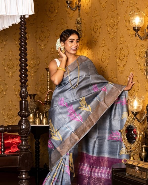 Nakshipar Yellow, Pink & Blue print on Gray Zari Border Tussar Saree