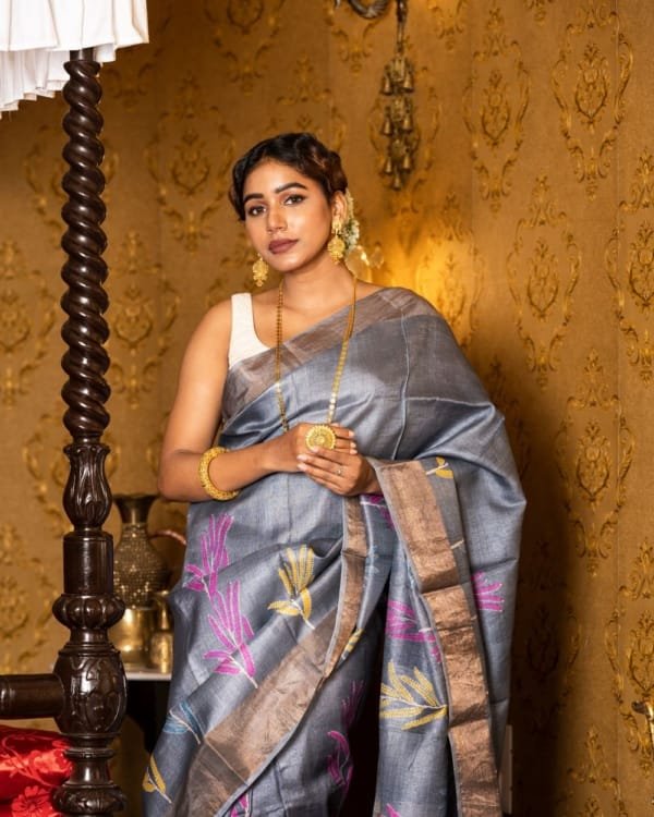 Nakshipar Yellow, Pink & Blue print on Gray Zari Border Tussar Saree
